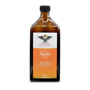 ine dunkelbraune Glasflasche mit schwarzem Schraubverschluss und orangen Etikett des Grazer Aktiv Tonikum.