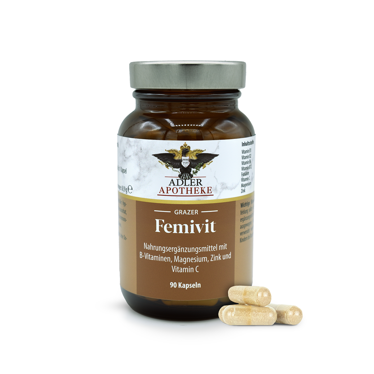 Ein dunkelbraunes Glas mit silbernen Schraubverschluss und braunem Etikett der Grazer Femivit Kapseln. Im Vordergrund liegen 4 gelbe Kapseln zur Ansicht