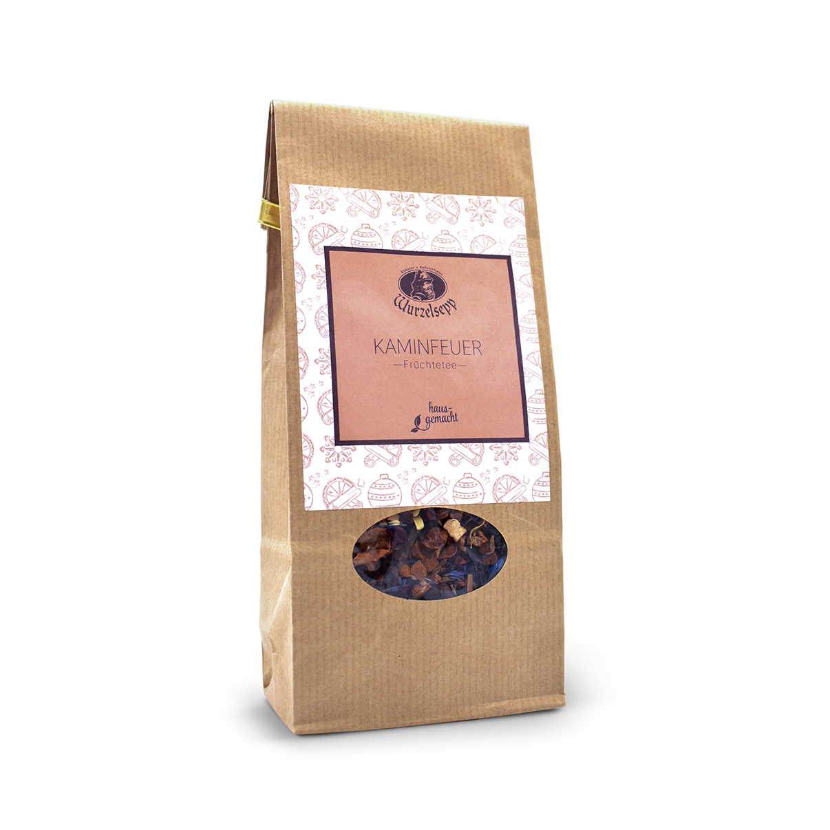 Braune Teeverpackung mit einem lachsfarbenen Etikett auf dem Wintermotive abgebildet sind.
