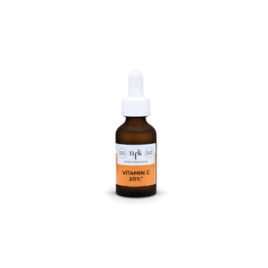 NFK Vitamin C Serum 20 % Aktiv-Konzentrat als Serum in einer braunen Glasflasche (20 ml), mit Tropferpipette und Etikett in weißer und orangefarbener Farbe, vor weißem Hintergrund.